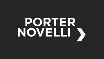 Porter Novelli logo. Text is white on a dark gray background. On the right is a > symbol.