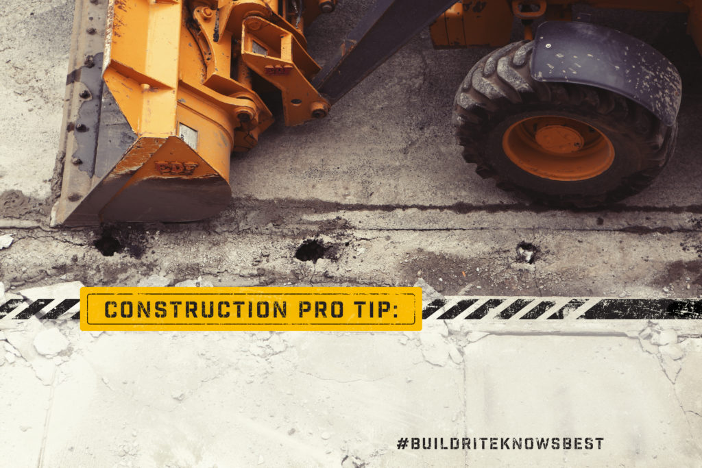 Side of a construction vehicle. Industrial font reads "Construction Pro Tip: #BuildriteKnowsBest".