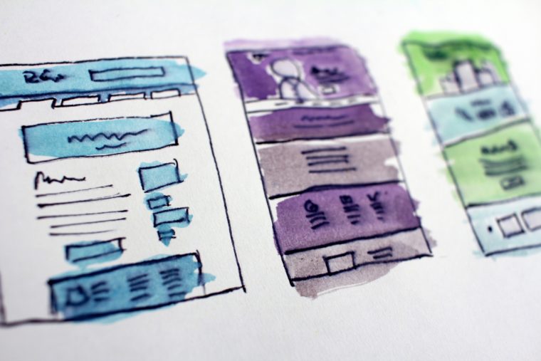 Pen and watercolor drawings of different webpages. One page is blue, the other is purple.