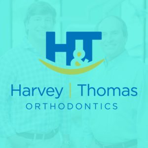 Blue - Harvey and Thomas Orthodontics Testimonial Logo