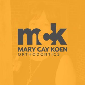 Orange - Mary Cay Koen Orthodontics Testimonial Logo